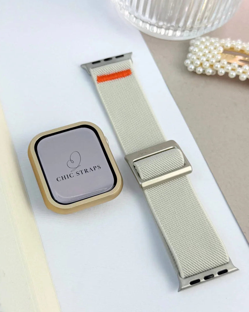 Smartwatch with a beige strap on a white surface, branded 'Chic Straps'.