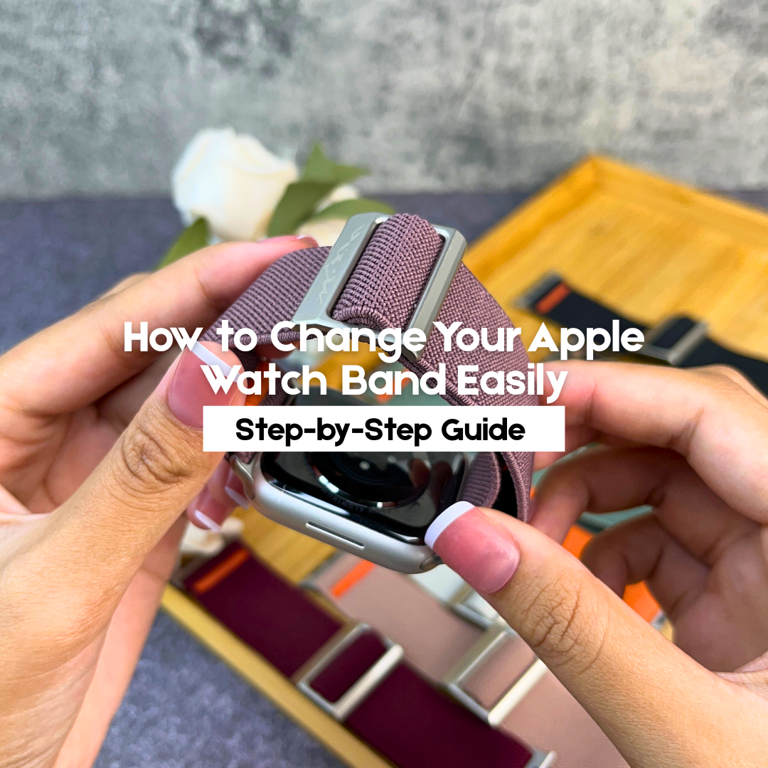 Close-up of hands holding an Apple Watch with a purple fabric loop band, showcasing how to change the watch band. 